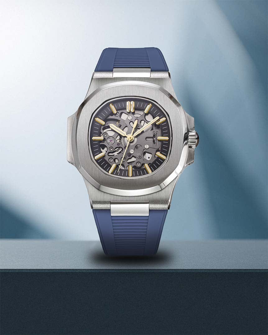Nomods Aquanaut-Inspired Seiko Mod with Silver Finish and Blue Rubber Strap